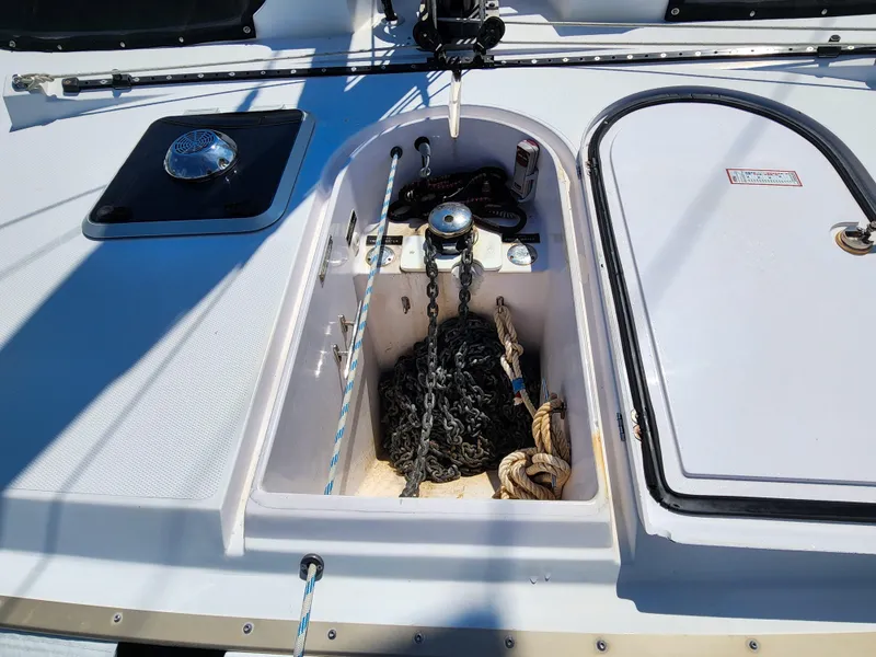 Slide: The Image of Anchor locker on 2014 Antares 44i sailboat with chain and rope storage. - 36