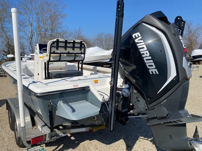 Slide: The Image of 2020 Key West 230 Bay Reef boat with Evinrude engine on trailer. - 3