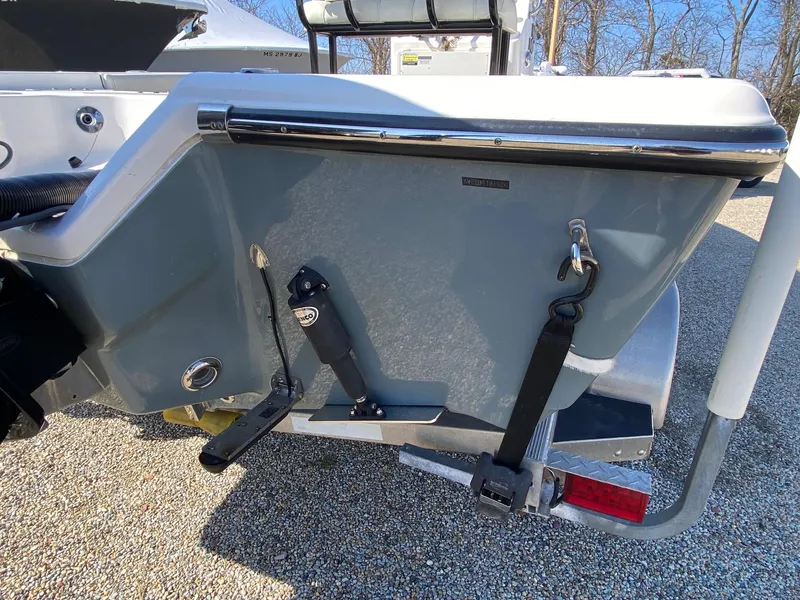 Slide: The Image of 2020 Key West 230 Bay Reef boat transom with trailer, featuring sleek design and sturdy construction. - 7