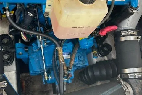 Slide: The Image of Engine compartment of a 2004 Tiara Yachts 2900 Coronet, showcasing mechanical components. - 11