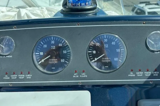 Slide: The Image of Dashboard of a 2004 Tiara Yachts 2900 Coronet with gauges and indicators. - 3