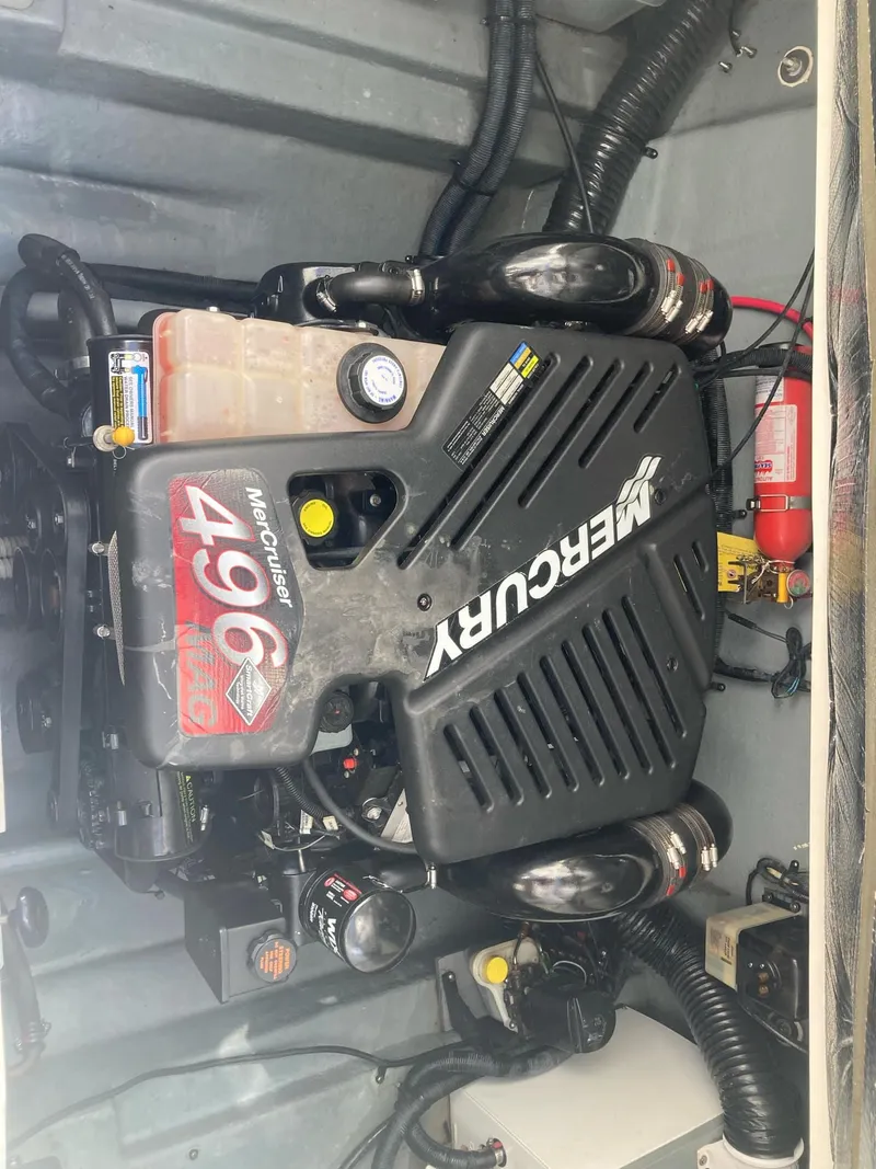 Slide: The Image of Mercury 496 engine in a 2003 Sea Ray 280 Sundancer boat. - 10