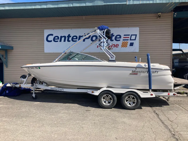 Slide: The Image of 2008 MasterCraft MariStar 215 boat on trailer at Center Pointe Marine. - 0