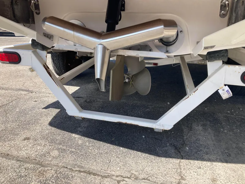 Slide: The Image of Rear view of 2008 MasterCraft MariStar 215 boat on trailer, showing propeller and exhaust. - 5