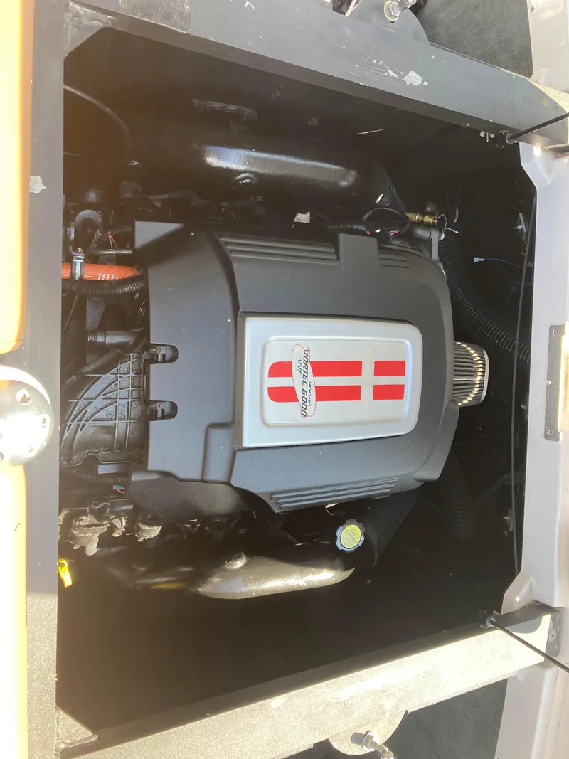 Slide: The Image of 2008 MasterCraft MariStar 215 engine compartment, showcasing a powerful inboard motor. - 9