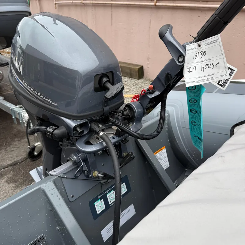 Slide: The Image of 2023 Highfield CL290 boat with Yamaha outboard motor, close-up view. - 10