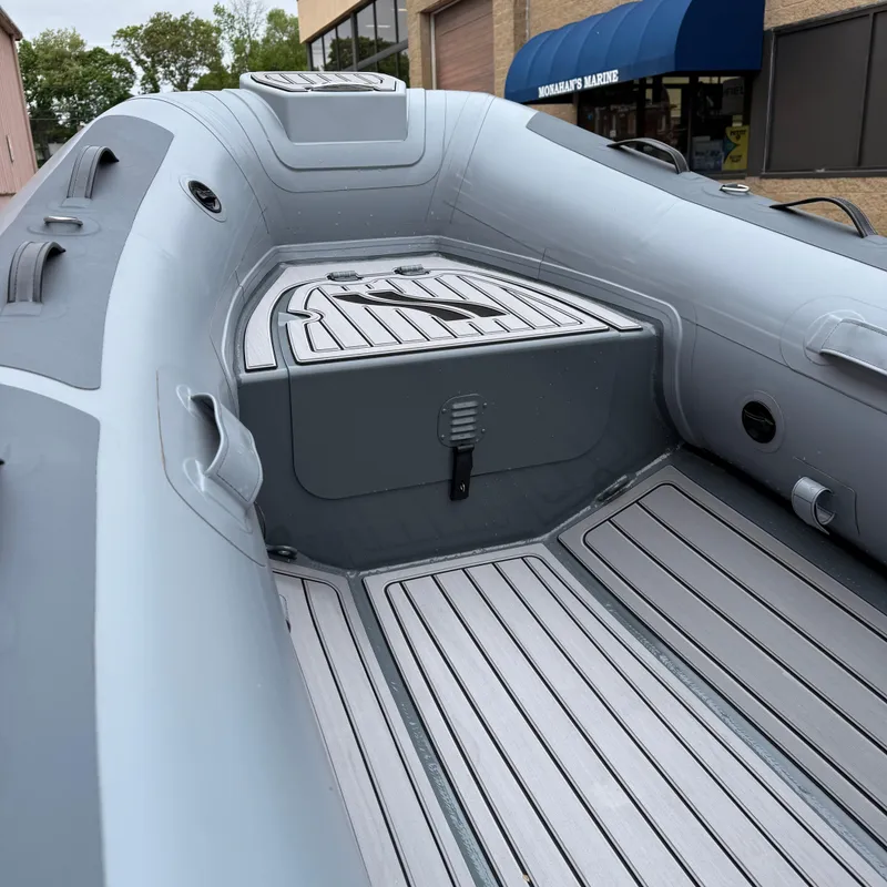 Slide: The Image of 2023 Highfield CL290 inflatable boat interior with sleek design and modern features. - 5