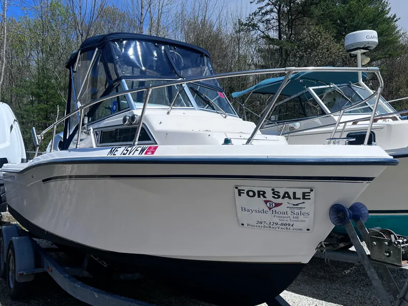 Slide: The Image of 1994 Grady-White 20 Adventure boat for sale, displayed on a trailer. - 1