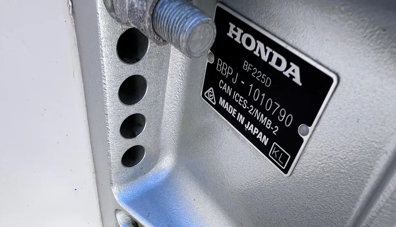 Slide: The Image of Honda BF225D engine plate on a 1994 Grady-White 20 Adventure boat. - 10