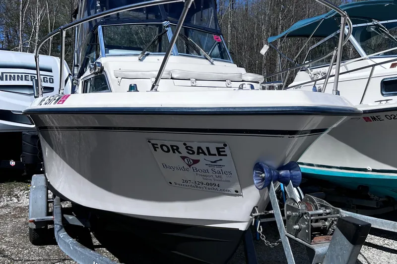 Slide: The Image of 1994 Grady-White 20 Adventure boat for sale, displayed on a trailer. - 9