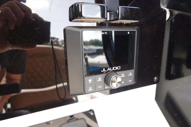 Slide: The Image of JL Audio system on 2026 Sea Hunt BX 25 FS boat dashboard. - 19
