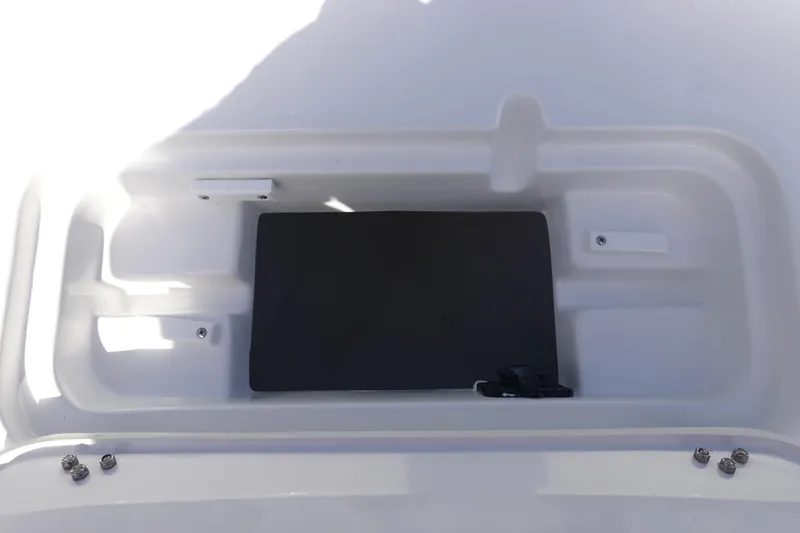 Slide: The Image of Storage compartment on a 2026 Sea Hunt BX 25 FS boat. - 35