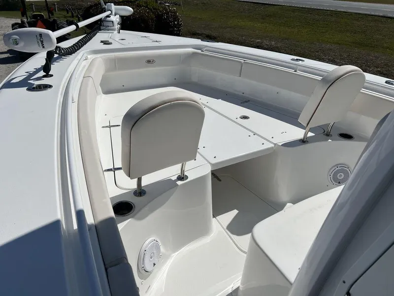 Slide: The Image of 2022 Sea Hunt Gamefish 27 Forward Seating, spacious white deck with comfortable seating. - 12