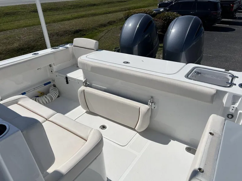 Slide: The Image of 2022 Sea Hunt Gamefish 27 boat interior with forward seating and dual engines. - 15