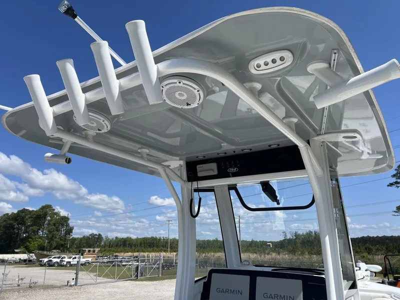 Slide: The Image of 2022 Sea Hunt Gamefish 27 boat with rod holders and Garmin electronics. - 19