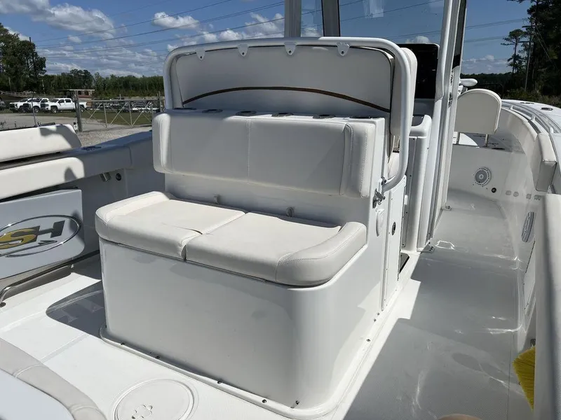 Slide: The Image of 2022 Sea Hunt Gamefish 27 Forward Seating, featuring comfortable white seating and sleek design. - 20