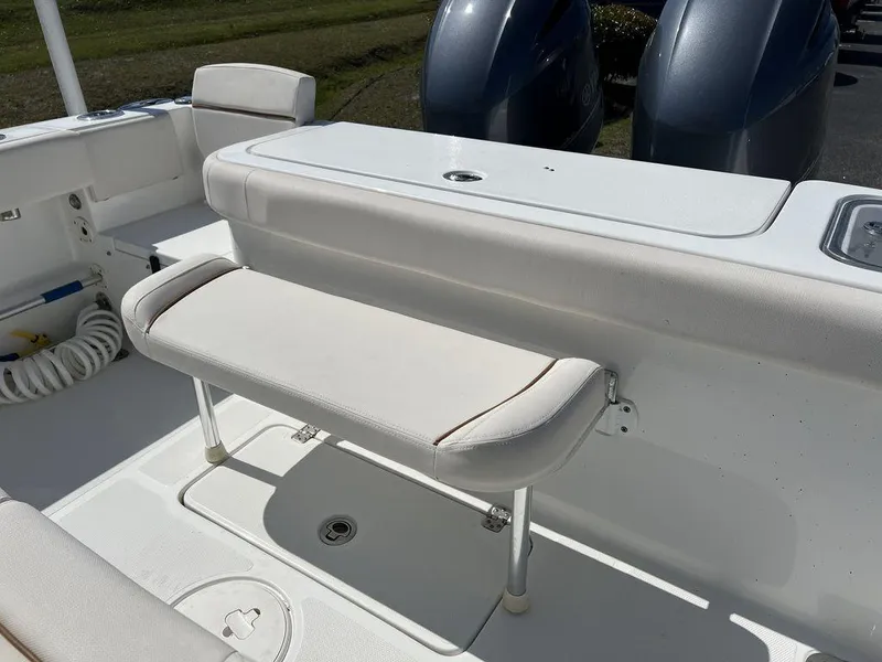 Slide: The Image of 2022 Sea Hunt Gamefish 27 Forward Seating boat interior with foldable bench seat. - 21