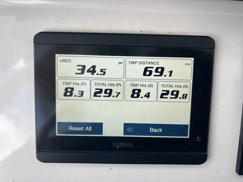 Slide: The Image of Yamaha display showing fuel usage and trip data on 2022 Sea Hunt Gamefish 27 boat. - 25