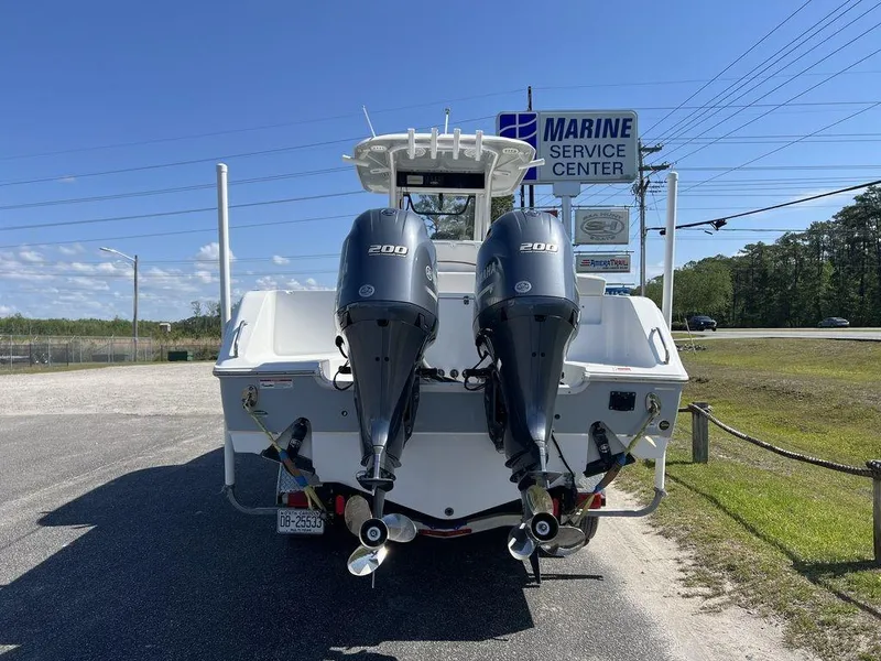 Slide: The Image of 2022 Sea Hunt Gamefish 27 with twin 200 HP engines at marine service center. - 8