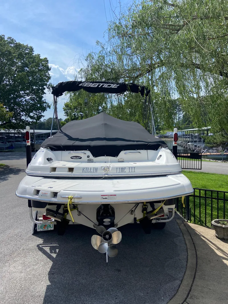 Slide: The Image of 2008 Ebbtide 2700 SS Bow Rider/CD boat parked on a sunny day. - 1