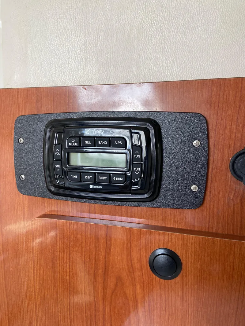 Slide: The Image of Infinity stereo system on 2008 Ebbtide 2700 SS Bow Rider/CD boat dashboard. - 14