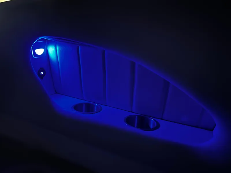Slide: The Image of Interior of 2008 Ebbtide 2700 SS Bow Rider with blue LED lighting and cup holders. - 15