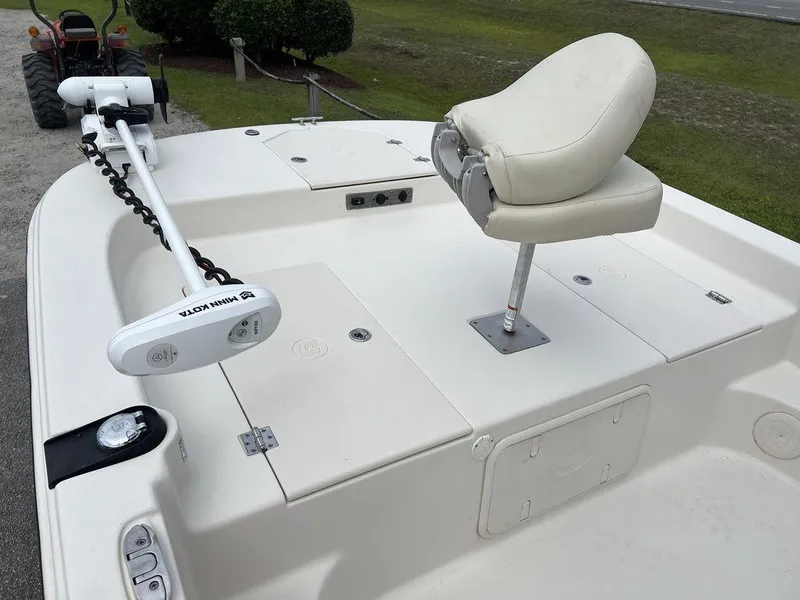 Slide: The Image of 2023 Carolina Skiff 21 LS boat deck with seat and trolling motor. - 10