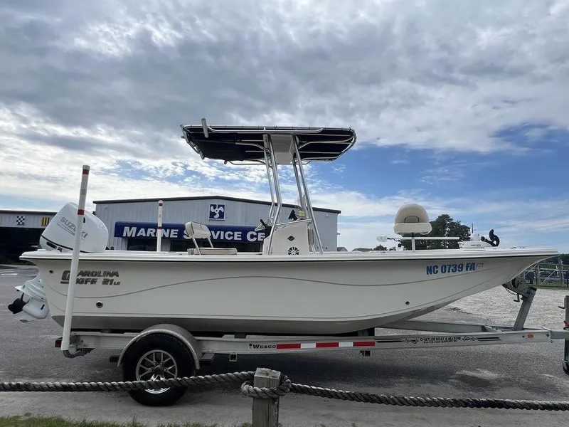 Slide: The Image of 2023 Carolina Skiff 21 LS boat on trailer at marine service center. - 4