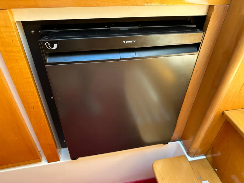 Slide: The Image of Dometic refrigerator in 1994 Bertram 30 Express Fisherman boat interior. - 24