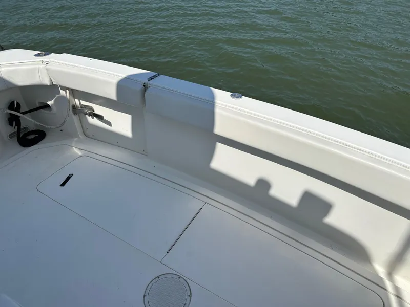 Slide: The Image of 1994 Bertram 30 Express Fisherman boat deck with water view. - 27