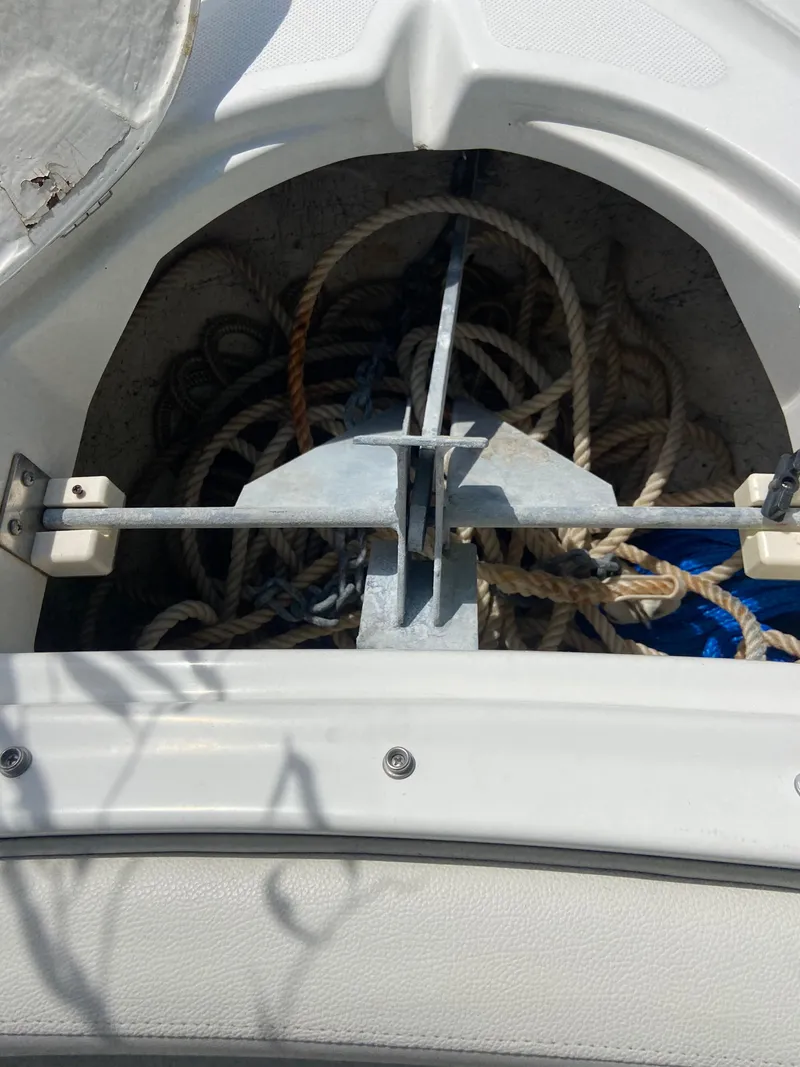 Slide: The Image of Anchor and ropes in 2008 Ebbtide 2700 Cuddy Bow Rider storage compartment. - 21