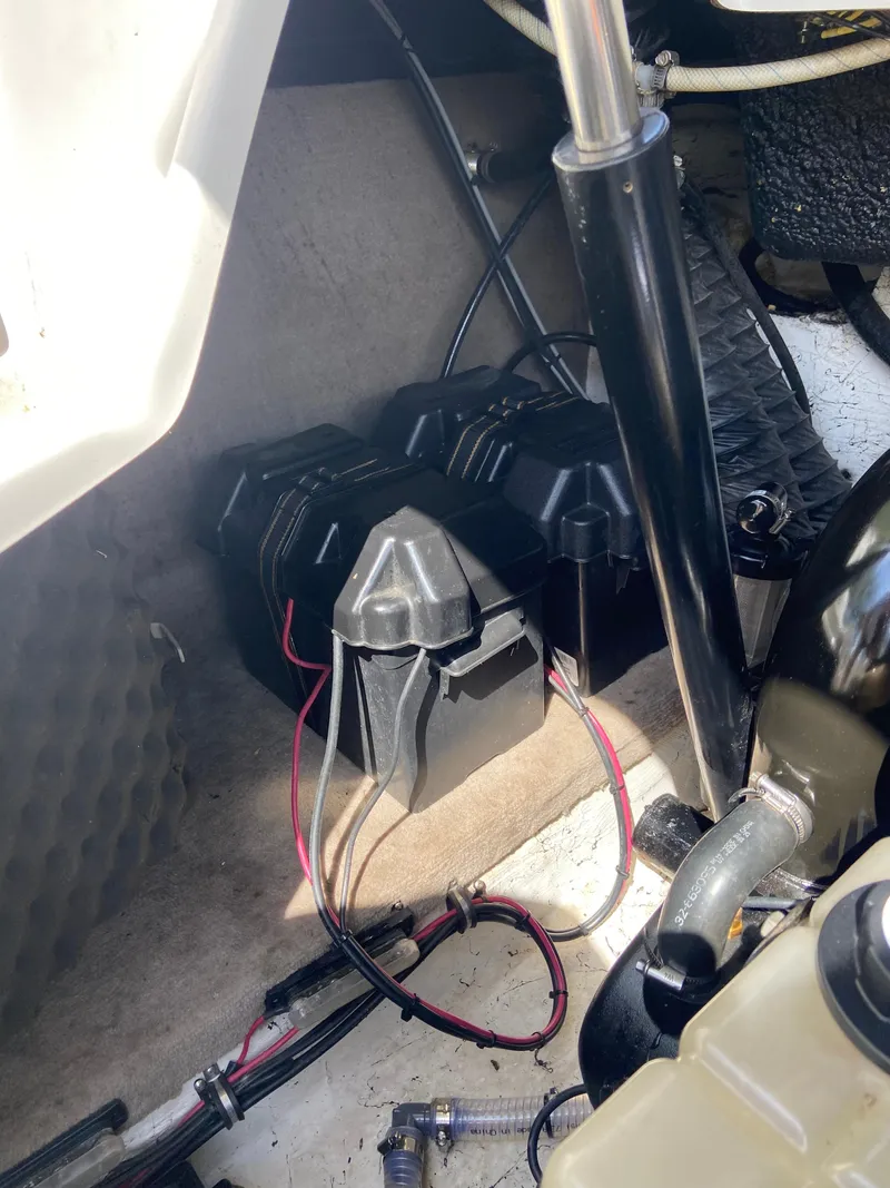 Slide: The Image of Battery compartment of 2008 Ebbtide 2700 Cuddy Bow Rider boat. - 23