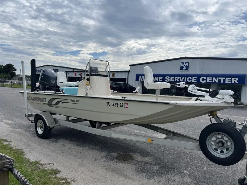 Slide: The Image of 2014 Alumacraft 18' All Welds MV 1860 CC boat on trailer at marine service center. - 3