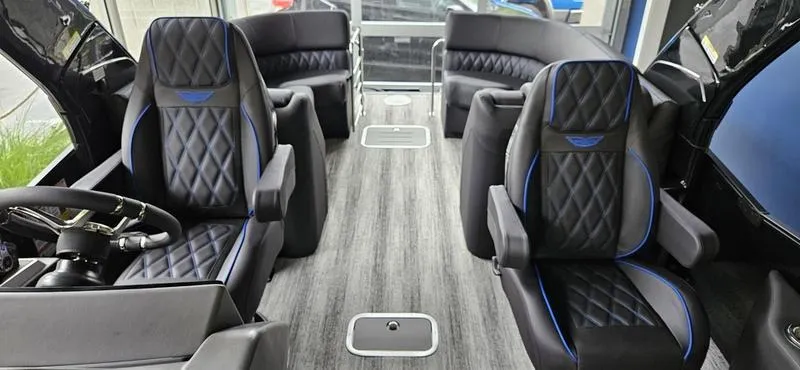 Slide: The Image of Luxurious interior of 2025 Bennington Q 25 QFBA pontoon boat with plush seating. - 6