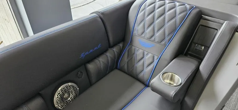 Slide: The Image of Luxurious seating in 2025 Bennington Q 25 QFBA with quilted design and cup holder. - 8