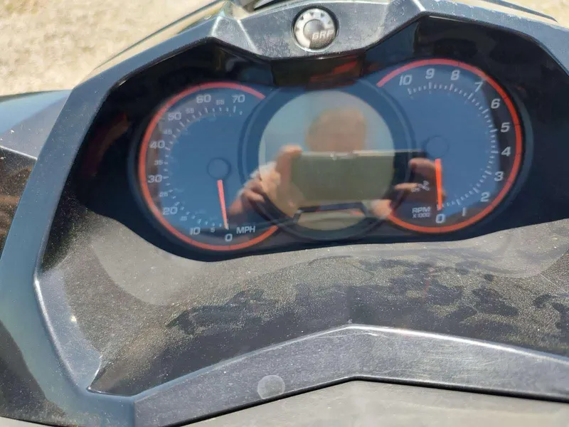 Slide: The Image of Dashboard of a 2013 Sea-Doo Wake 155 with speedometer and tachometer. - 5