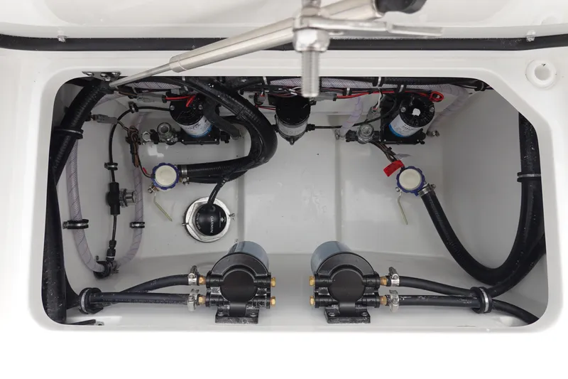 Slide: The Image of 2026 Sea Hunt Gamefish 28 FS livewell with clear lid and secure latch. - 11