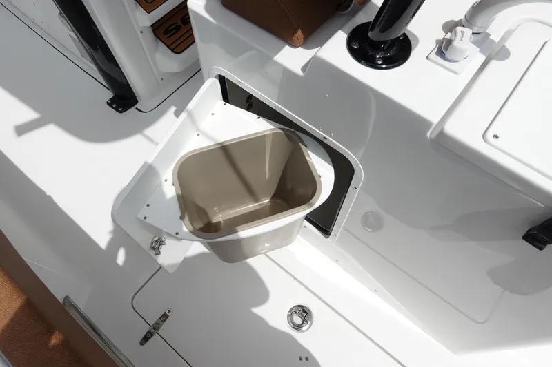 Slide: The Image of 2026 Sea Hunt Gamefish 28 FS boat with T-top and rod holders against a cloudy sky. - 17