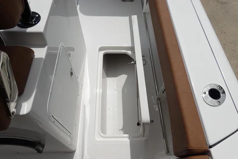 Slide: The Image of 2026 Sea Hunt Gamefish 28 FS boat interior with open storage compartments. - 21