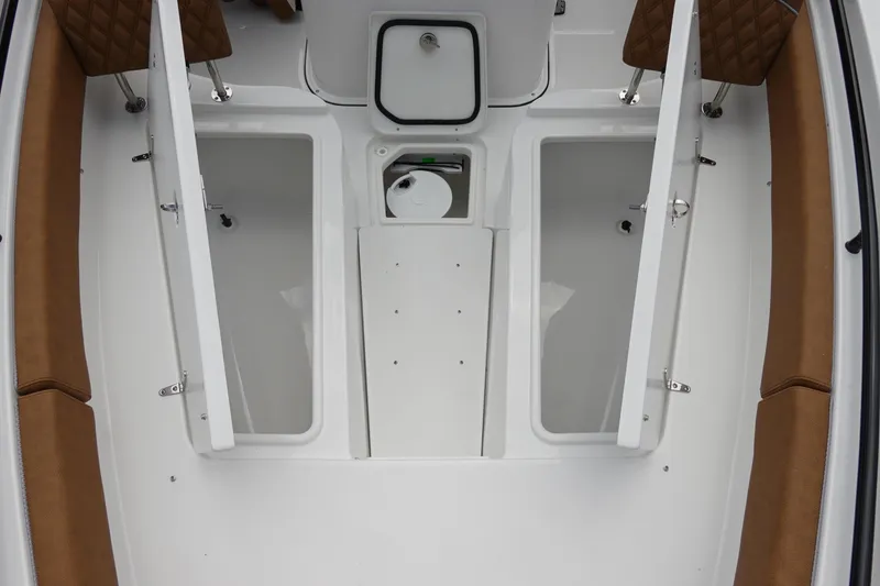Slide: The Image of 2026 Sea Hunt Gamefish 28 FS boat deck with storage compartments and seating. - 35