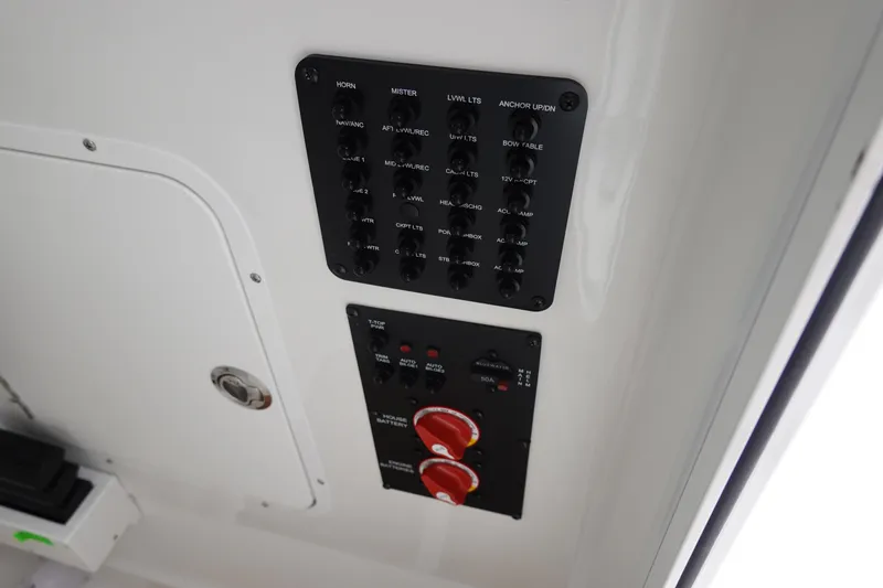 Slide: The Image of Interior of 2026 Sea Hunt Gamefish 28 FS boat, featuring a compact marine toilet. - 41