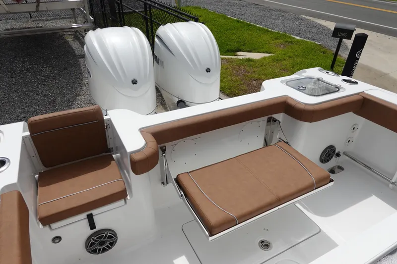 Slide: The Image of Twin outboard engines on a 2026 Sea Hunt Gamefish 28 FS boat. - 8