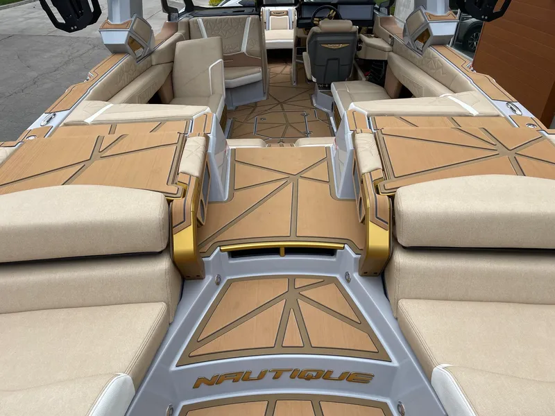 Slide: The Image of 2024 Nautique Super Air Nautique G25 Paragon interior with luxurious seating and modern design. - 4