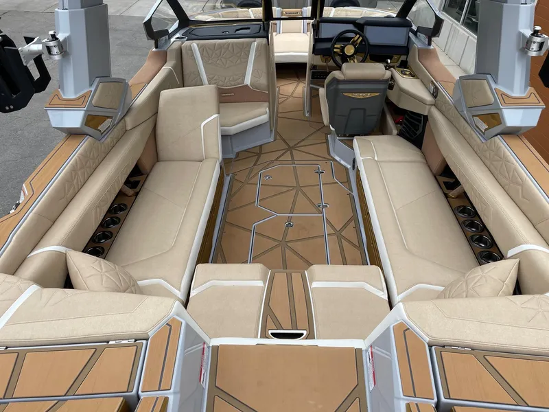 Slide: The Image of 2024 Nautique Super Air Nautique G25 Paragon interior with luxurious seating and modern design. - 5