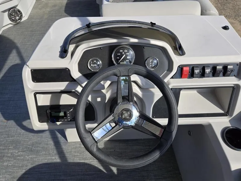 Slide: The Image of Steering console of 2025 Godfrey Xperience 2286 SFLX Sport Tube boat. - 10