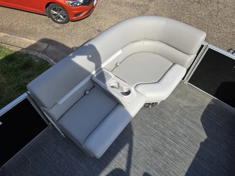 Slide: The Image of 2025 Godfrey Xperience 2286 SFLX Sport Tube boat seating with gray upholstery and cup holders. - 8