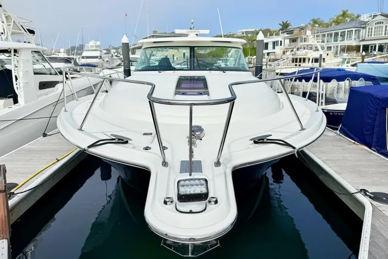 Slide: The Image of 2020 Tiara Yachts 3900 Open "Coronet" docked at marina. - 1