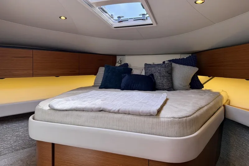 Slide: The Image of Luxurious cabin interior of 2020 Tiara Yachts 3900 Open "Coronet" with cozy bedding. - 38