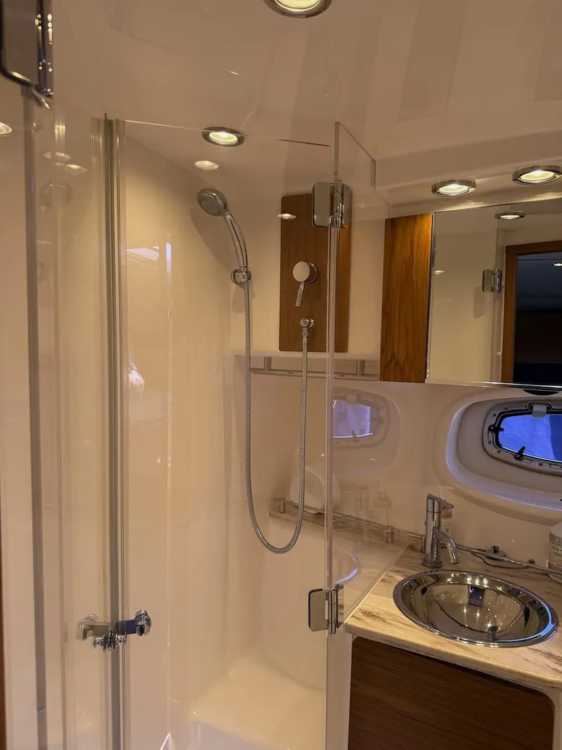 Slide: The Image of Luxurious bathroom in 2020 Tiara Yachts 3900 Open "Coronet" with modern fixtures. - 45