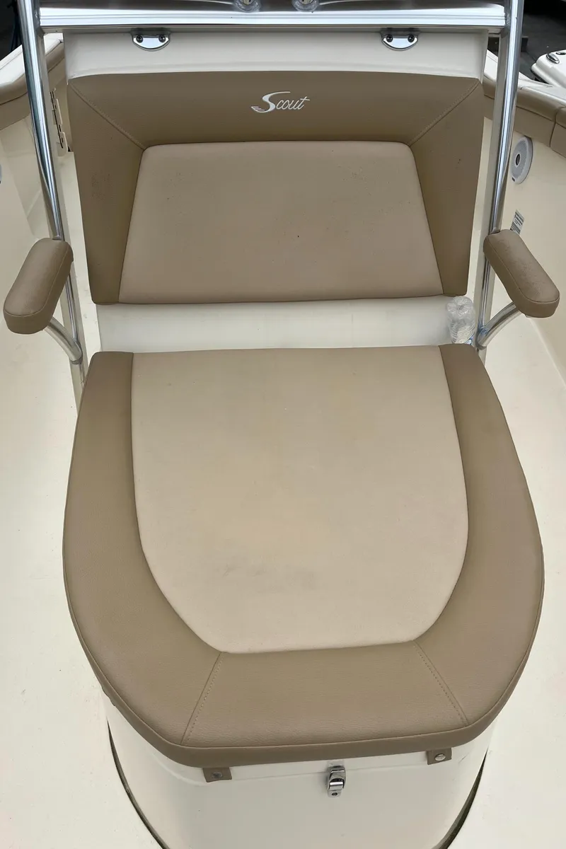 Slide: The Image of 2020 Scout 215 XSF boat seat with beige upholstery and backrest. - 16